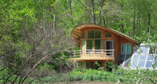 the bookend house at driftless farm and attached greenhouse