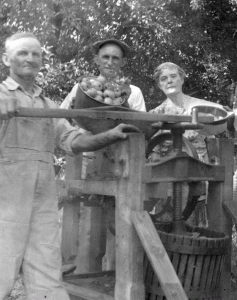 my-grandpa-and-his-apples ...That's my grandpa in the middle. I wonder what those apples tasted like!