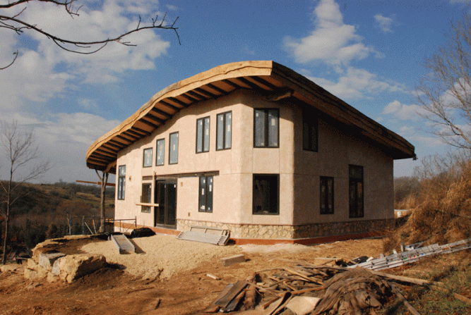 The exterior plaster has been hardening in place for a number of weeks,and now it is time for the interior straw bale walls to get plastered!
