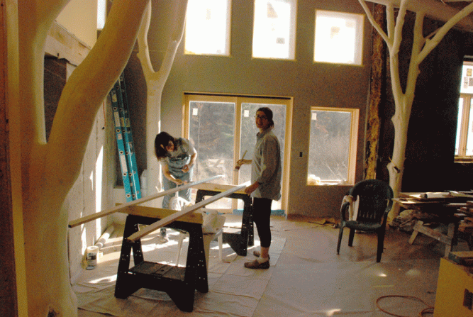 KJ and Della painting trim the day after Thanksgiving.