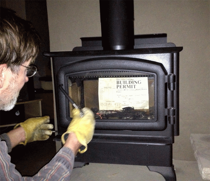 We used our very first fire, which came right after our final building inspection to ceremonially burn our Building Permit