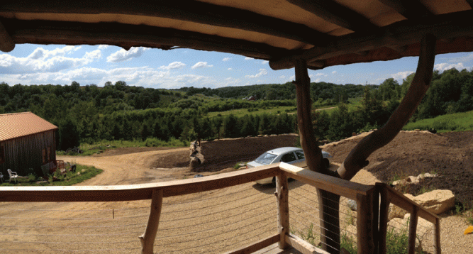 I can't imagine a better view from one's front porch than the garden where one's food is growing.  We are going to cover crop it this fall, and then start planting in part of it next spring.  It's big enough that we can always have part of it in cover crop. As I heard in a song once:  Only two things that money can't buy -- true love and home-grown tomatoes.